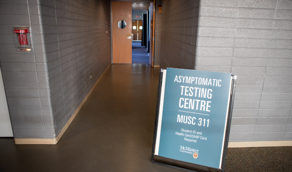 Sandwich board sign for the Asymptomatic Testing Centre in front of centre entrance.
