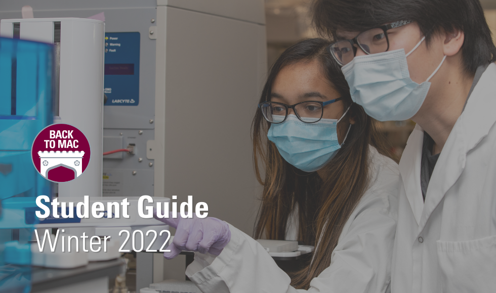 two masked students in a lab look at results. Text overlay: "student guide winter 2022"